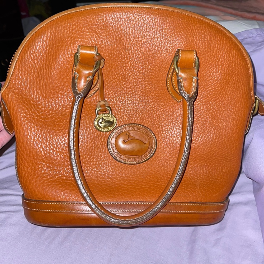 Vintage Dooney & Bourke all weather leather tan Norfolk bag.